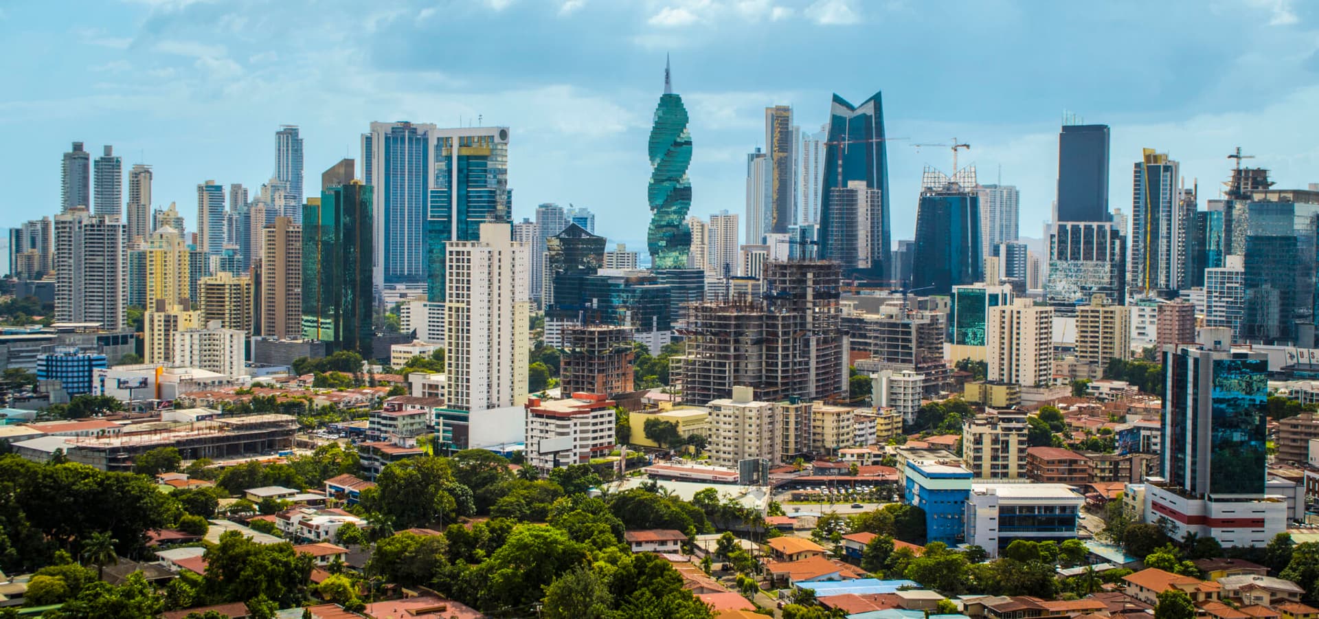 The skyscrapers of downtown Panama City, with new buildings under construction in the foreground.