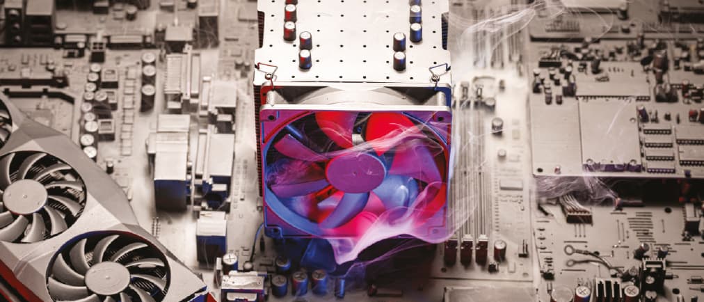 A computer processor fan overheats with smoke coming out