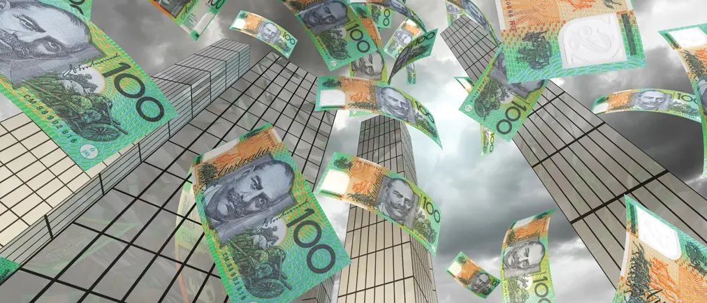 Australian dollar notes floating down from the sky in an urban city environment